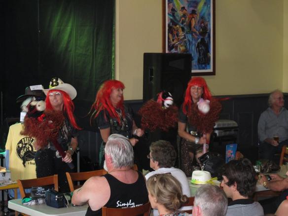 Yes, they really are dancing with toy horses with wigs