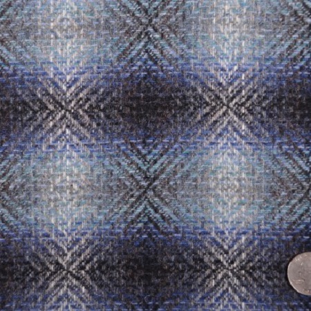 Italian Carolina Herrera Black/White/Blended Blue Plaid Suiting from Mood Fabrics