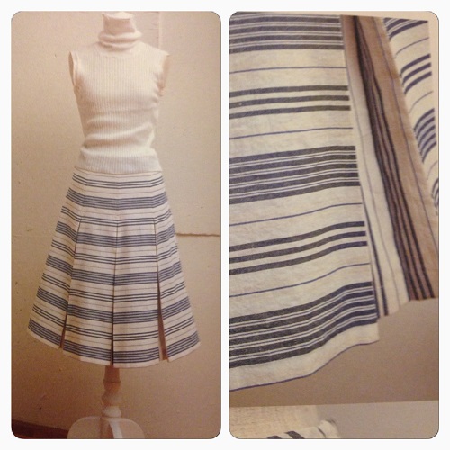 I love this. A simple but effective 'surprise' the strips change direction inside the pleat