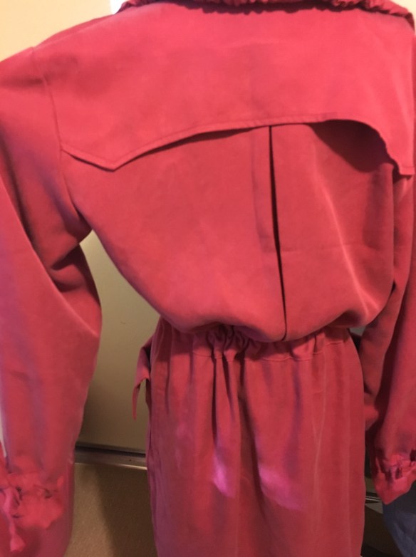 A back pleat and flap - more traditional trench design features